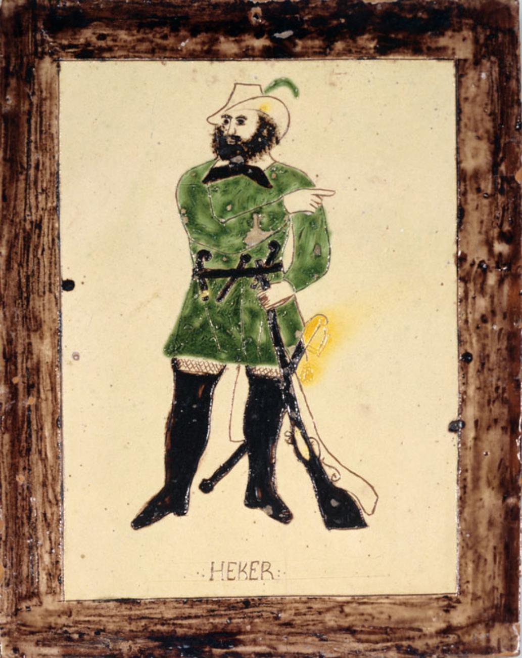 Männliche Figur in grünem Outfit mit Gewehr, anmutig stehend und nach vorne zeigend, eingefasst von einem Holzrahmen.