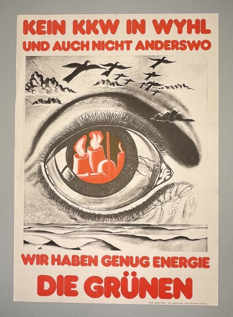 Plakat gegen Atomkraft, zeigt ein Auge mit Energiesymbolen und dem Text: "Kein KKW in Wyhl, wir haben genug Energie."